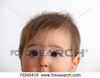 Stock Photograph - baby girl (6-9 
months) open eyes, 
portrait, high 
section. fotosearch 
- search stock 
photos, pictures, 
images, and photo 
clipart