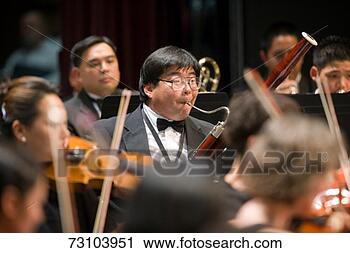Stock Photography - bassoon players 
and symphony orchestra 
musicians. fotosearch 
- search stock 
photos, pictures, 
images, and photo 
clipart
