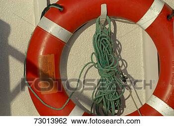 Stock Photo - life belt on dock, 
close-up. fotosearch 
- search stock 
photos, pictures, 
images, and photo 
clipart
