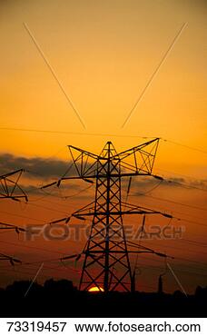 Picture - silhouette of 
electricity pylons. 
fotosearch - search 
stock photos, 
pictures, images, 
and photo clipart