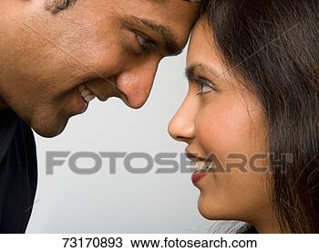 Stock Photo - young couple, 
face to face, 
close-up. fotosearch 
- search stock 
photos, pictures, 
images, and photo 
clipart
