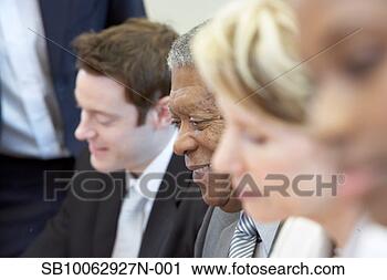 Stock Photography - business people 
sitting side by 
side, side view 
(differential 
focus). fotosearch 
- search stock 
photos, pictures, 
images, and photo 
clipart