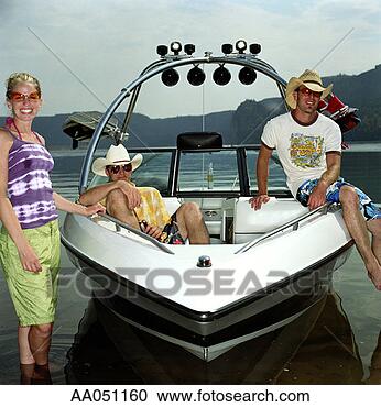 Stock Photography - three friends 
on boat, in lake, 
summer, lake roosevelt, 
washington. fotosearch 
- search stock 
photos, pictures, 
images, and photo 
clipart