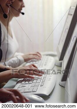 Stock Photography - row of people 
typing on computer 
keyboards, close-up 
of hands. fotosearch 
- search stock 
photos, pictures, 
images, and photo 
clipart