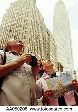 Stock Photo - couple sightseeing 
in new york city. 
fotosearch - search 
stock photos, 
pictures, images, 
and photo clipart