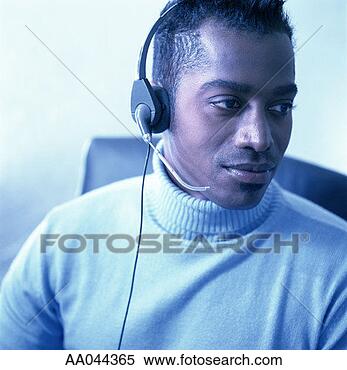 Stock Image - customer service 
rep with telephone 
headset. fotosearch 
- search stock 
photos, pictures, 
images, and photo 
clipart