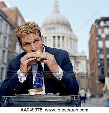 Stock Photo - businessman eating 
sandwich, portrait. 
fotosearch - search 
stock photos, 
pictures, images, 
and photo clipart