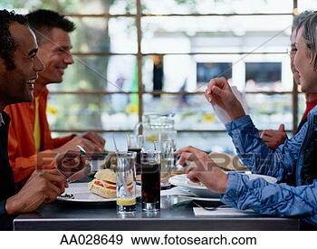 Stock Photograph - coworkers eating 
lunch. fotosearch 
- search stock 
photos, pictures, 
images, and photo 
clipart