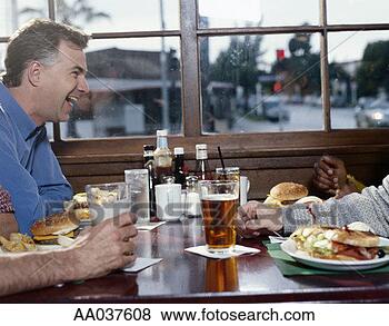 Stock Photo - men eating and 
drinking in pub. 
fotosearch - search 
stock photos, 
pictures, images, 
and photo clipart