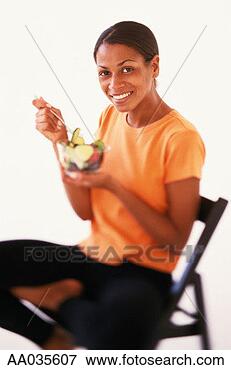 Picture - woman eating a 
salad. fotosearch 
- search stock 
photos, pictures, 
images, and photo 
clipart