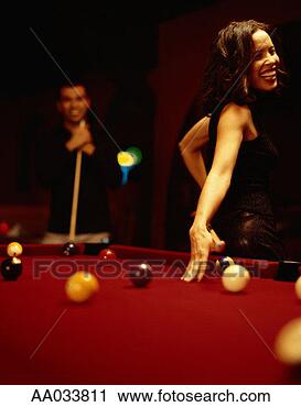 Stock Photography - woman shooting 
pool from behind 
back. fotosearch 
- search stock 
photos, pictures, 
images, and photo 
clipart