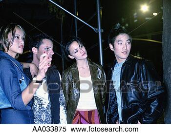 Stock Image - young adults out 
on the streets 
of new york. fotosearch 
- search stock 
photos, pictures, 
images, and photo 
clipart
