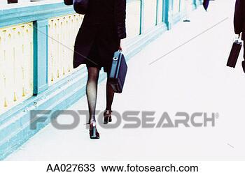 Stock Photo - low section of 
a walking businesswoman. 
fotosearch - search 
stock photos, 
pictures, images, 
and photo clipart