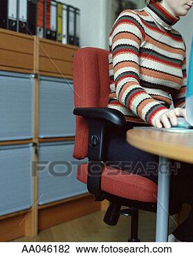 Stock Photo - woman using computer 
keyboard (mid 
section). fotosearch 
- search stock 
photos, pictures, 
images, and photo 
clipart