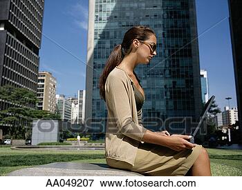 Picture - woman using laptop 
computer, side 
view. fotosearch 
- search stock 
photos, pictures, 
images, and photo 
clipart