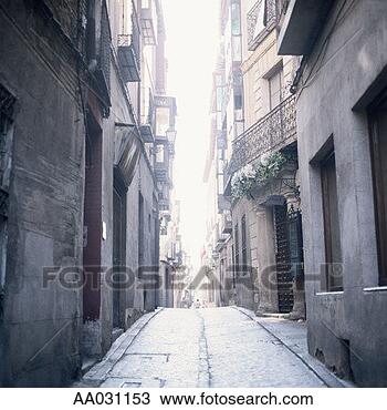 Stock Photo - narrow street 
in toledo, spain. 
fotosearch - search 
stock photos, 
pictures, images, 
and photo clipart