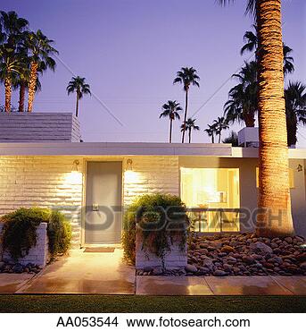 Stock Photo - exterior of brick 
home with palm 
trees in background. 
fotosearch - search 
stock photos, 
pictures, images, 
and photo clipart
