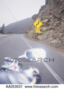 Stock Photography - view from motorcycle, 
winding mountain 
road, california, 
usa. fotosearch 
- search stock 
photos, pictures, 
images, and photo 
clipart