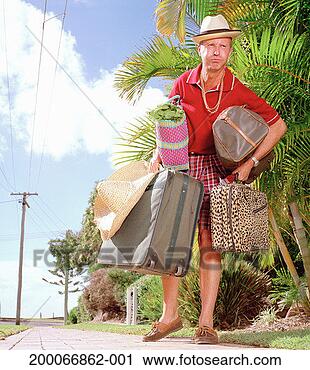 Stock Photography - mature man struggling 
with suitcases 
and bags. fotosearch 
- search stock 
photos, pictures, 
images, and photo 
clipart