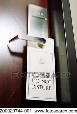 Stock Photography - do not disturb 
sign hanging from 
hotel door handle 
(selective focus). 
fotosearch - search 
stock photos, 
pictures, images, 
and photo clipart