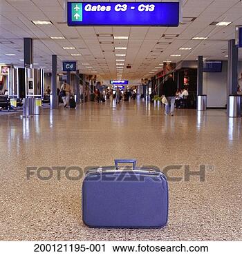 Stock Photography - unattended suitcase 
sitting in airport 
hallway. fotosearch 
- search stock 
photos, pictures, 
images, and photo 
clipart