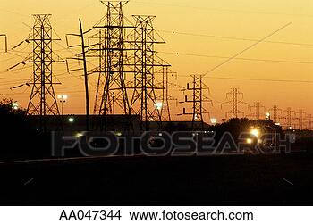 Stock Photo - freight train 
passing electricity 
pylons, dusk. 
fotosearch - search 
stock photos, 
pictures, images, 
and photo clipart