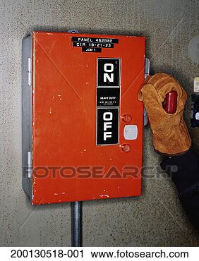 Stock Photography - industrial worker 
with gloved hand 
on handle of circuit 
breaker. fotosearch 
- search stock 
photos, pictures, 
images, and photo 
clipart