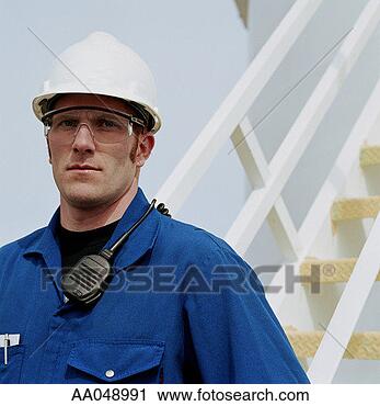 Stock Photography - male worker wearing 
hard hat, and 
protective glasses, 
portrait. fotosearch 
- search stock 
photos, pictures, 
images, and photo 
clipart