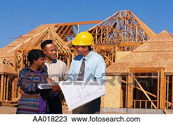 Stock Photo - couple talking 
with architect 
at construction 
site. fotosearch 
- search stock 
photos, pictures, 
images, and photo 
clipart