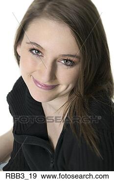 Stock Photograph - close up portrait 
of a young woman 
in a black sweater 
as she smiles. 
fotosearch - search 
stock photos, 
pictures, images, 
and photo clipart