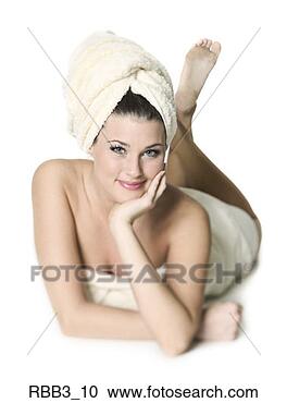 Stock Photography - full body portrait 
of a young caucasian 
woman wrapped 
in a towels. fotosearch 
- search stock 
photos, pictures, 
images, and photo 
clipart