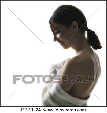 Stock Photo - medium shot of 
a young woman 
as she wraps herself 
up in a white 
sheet. fotosearch 
- search stock 
photos, pictures, 
images, and photo 
clipart