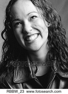 Stock Photo - a caucasian woman 
with long curly 
hair laughs. fotosearch 
- search stock 
photos, pictures, 
images, and photo 
clipart