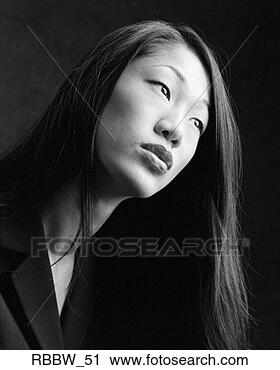 Stock Photography - a side profile 
of a pretty asian 
american woman. 
fotosearch - search 
stock photos, 
pictures, images, 
and photo clipart