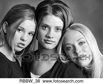Stock Photo - three beautiful 
caucasian teenage 
girls pose together. 
fotosearch - search 
stock photos, 
pictures, images, 
and photo clipart