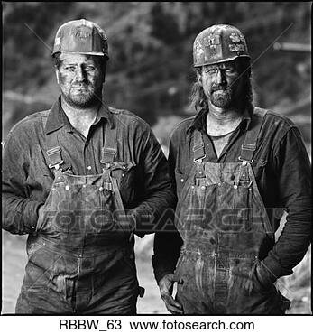 Stock Photo - two caucasian 
coal miners pause 
at work for a 
picture. fotosearch 
- search stock 
photos, pictures, 
images, and photo 
clipart