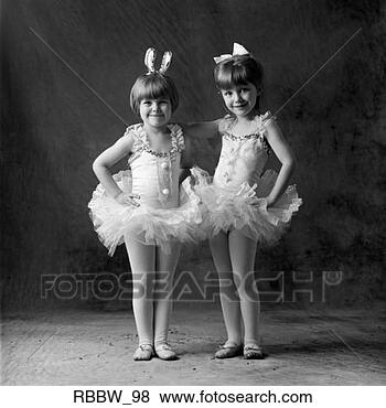 Stock Photo - two young caucasian 
sisters pose in 
their ballet costumes 
ready to. fotosearch 
- search stock 
photos, pictures, 
images, and photo 
clipart
