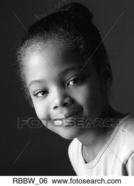 Stock Photo - a young african 
american girl 
grins. fotosearch 
- search stock 
photos, pictures, 
images, and photo 
clipart