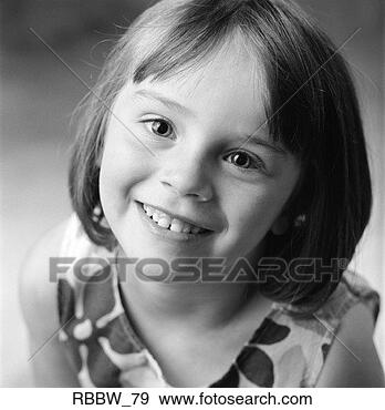 Stock Photograph - a young caucasian 
girl sports a 
toothy grin. fotosearch 
- search stock 
photos, pictures, 
images, and photo 
clipart