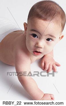 Stock Photo - an asian baby 
curiously looks 
up while crawling. 
fotosearch - search 
stock photos, 
pictures, images, 
and photo clipart