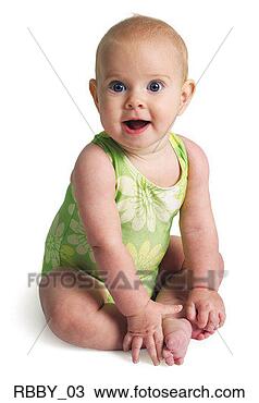 Stock Photo - a caucasian baby 
girl sits and 
looks surprised. 
fotosearch - search 
stock photos, 
pictures, images, 
and photo clipart