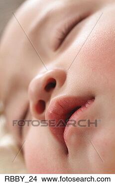 Stock Photo - extreme close 
up on an asian 
babys face while 
it lays asleep. 
fotosearch - search 
stock photos, 
pictures, images, 
and photo clipart