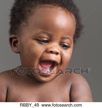 Stock Photograph - a shirtless african 
american baby 
opens its mouth 
wide in laughter. 
fotosearch - search 
stock photos, 
pictures, images, 
and photo clipart