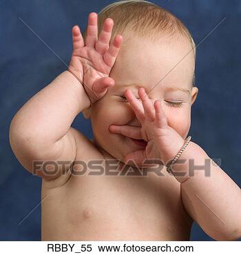 Stock Image - a shirtless caucasian 
baby puts its 
hands in front 
of its face as 
if. fotosearch 
- search stock 
photos, pictures, 
images, and photo 
clipart