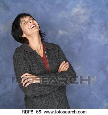 Stock Image - portrait ethnic 
looking woman 
in red shirt grey 
sweater she folds 
her. fotosearch 
- search stock 
photos, pictures, 
images, and photo 
clipart