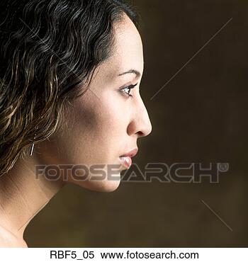 Stock Image - portrait of a 
young attractive 
ethnic looking 
woman shot in 
profile. fotosearch 
- search stock 
photos, pictures, 
images, and photo 
clipart