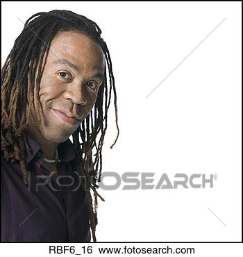 Stock Photo - portrait of a 
young adult male 
in a purple shirt 
as he turns and. 
fotosearch - search 
stock photos, 
pictures, images, 
and photo clipart