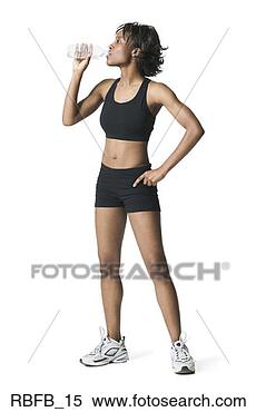 Stock Image - full body shot 
of a young adult 
woman in a black 
workout outfit 
as. fotosearch 
- search stock 
photos, pictures, 
images, and photo 
clipart