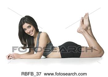 Picture - full body shot 
of young adult 
woman in black 
and grey exercise 
outfit. fotosearch 
- search stock 
photos, pictures, 
images, and photo 
clipart