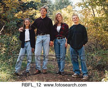 Stock Photo - family of four 
stand among trees. 
fotosearch - search 
stock photos, 
pictures, images, 
and photo clipart